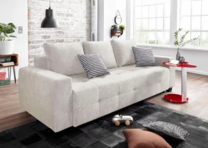 Sofa lova sidabrinės spalvos.